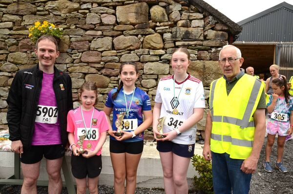 Junior 5K Female prizewinners. From left, Minister Alan Dillon TD, Maeve McGing (3rd), Grace Needham (1st), Saoirse Chambers (2nd), Seamus Moylette, Islandeady Cycling Club. Junior 5K Female prizewinners. From left, Minister Alan Dillon TD, Maeve McGing (3rd), Grace Needham (1st), Saoirse Chambers (2nd), Seamus Moylette, Islandeady Cycling Club.