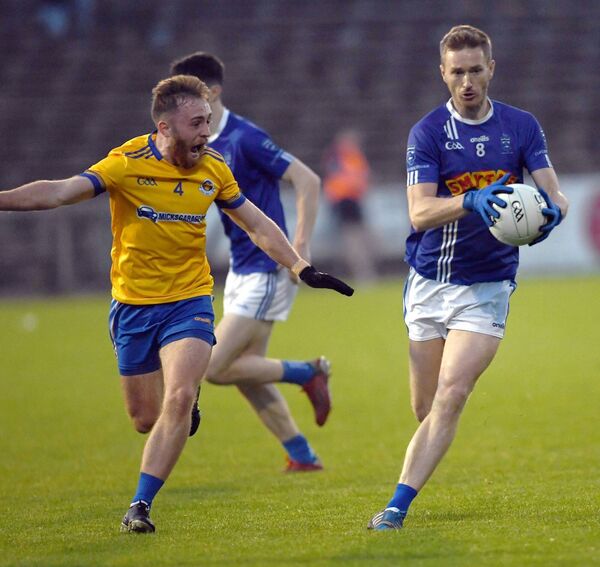 Brian Gallagher, Claremorris, is chased by Knockmore’s David McHale. Picture: David Farrell Photography Brian Gallagher, Claremorris, is chased by Knockmore’s David McHale. Picture: David Farrell Photography