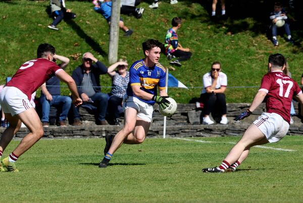 Ronan Commons of Mayo Gaels is watched by Balla's Conor Dunleavy and Ben Freyne. Picture: Michael Donnelly Ronan Commons of Mayo Gaels is watched by Balla's Conor Dunleavy and Ben Freyne. Picture: Michael Donnelly