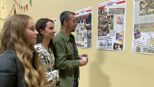 Meghan, Lisa and Declan Corbett admiring the fantastic wall display during the launch of the Jimmy Corbett (Declan’s Dad) Perpetual Cup which will be presented to the Mayo Senior Ladies Club Champions. Picture by Tom Quinn