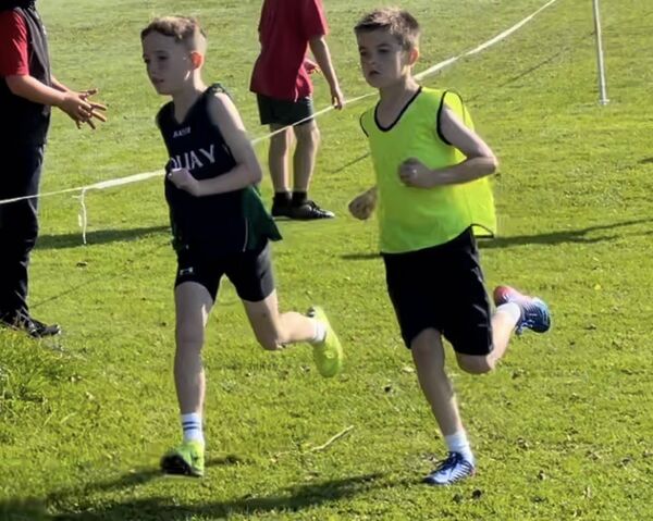 Kyle Molloy and Jamie Sweeney battle for the lead in the 3rd 4th class boys race. Kyle Molloy and Jamie Sweeney battle for the lead in the 3rd 4th class boys race.