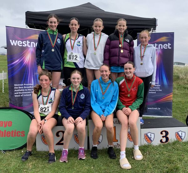 Competitors from the Westport and Moy Valley clubs after they finished first and second respectively in the U16 Girls teams competition. Competitors from the Westport and Moy Valley clubs after they finished first and second respectively in the U16 Girls teams competition.