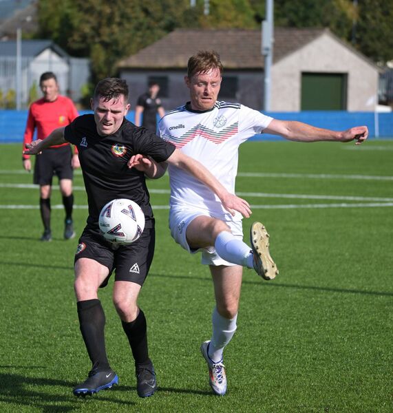Sligo/Leitrim’s Bradley Fowley in a tussle with Niall Brennan of Mayo League. Sligo/Leitrim’s Bradley Fowley in a tussle with Niall Brennan of Mayo League.