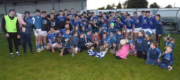 A jubilant Tooreen team and young supporters celebrate their victory over Ballyhaunis in the Mayo senior hurling championship A final at Adrian Freeman Park, Tooreen, last Saturday. The pulsating final went to extra time. Picture: David Farrell Photography 