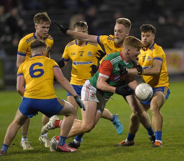 Ballina Stephenites’ Luke Feeney is surrounded by Knockmore players. Picture: David Farrell Photography Ballina Stephenites’ Luke Feeney is surrounded by Knockmore players. Picture: David Farrell Photography