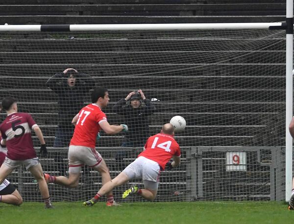 Moy Davitts substitute Brian Heneghan dives to punch the ball to the back of the Crossmolina net in the closing minutes of Sunday's final. Moy Davitts substitute Brian Heneghan dives to punch the ball to the back of the Crossmolina net in the closing minutes of Sunday's final.