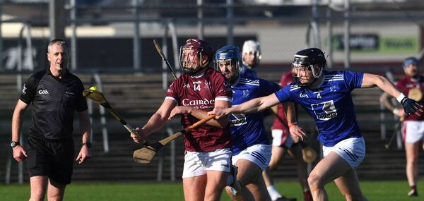 Tooreen’s Oisin Greally challenges St. Gabriel’s Sean Glynn for the sliothar. 