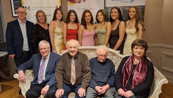 St Joseph’s Community College Charlestown and their history teacher Ann Leydon together with the Mayo Genealogy Group published the The Revolutionary Women of East Mayo and South Sligo 1918-1923 received a Mayo People of the Year Award at a ceremony held in Breaffy House Hotel recently. Pictured left to right; Cllr Gerry Murray, Ann Leydon (teacher) Leah Honan, Adrianna Gallagher, Mia Gallagher, Ethel Duffy, Lucy Tiernan and Alice Flannery. Front row; Seamus Bermingham, Sean Lrach, Martin Neary and Patricia Conway. 