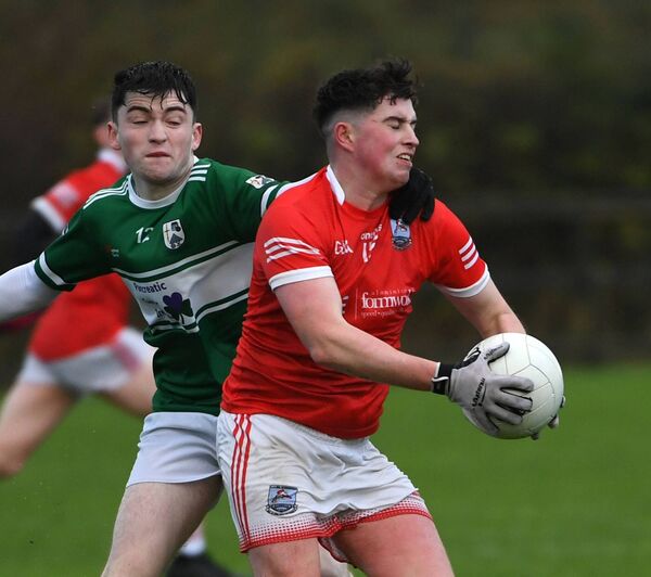 Daithi Cosgrove, who scored six points for Belmullet, is challenged by The Neale’s Niall Rochford. Picture: David Farrell Photography Daithi Cosgrove, who scored six points for Belmullet, is challenged by The Neale’s Niall Rochford. Picture: David Farrell Photography