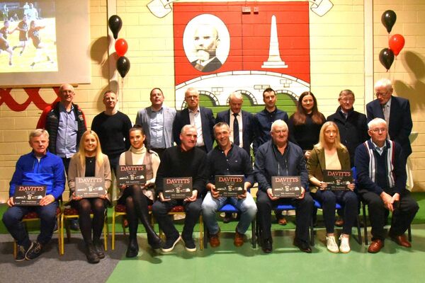 Davitts GAA Club officials and players with special guest Cora Staunton at the launch of their 50th-anniversary book. 