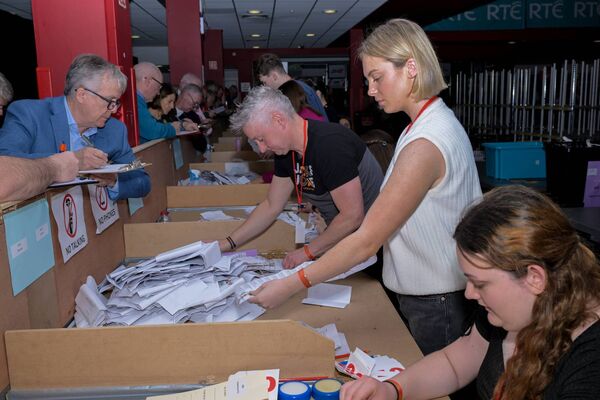 Count staff sort through the votes at the TF Royal Theatre in Castlebar last Saturday. Picture: John Corless Count staff sort through the votes at the TF Royal Theatre in Castlebar last Saturday. Picture: John Corless