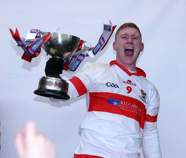 Coolera-Strandhill captain Peter Laffey lifts the Shane McGettigan Cup. He is the grandson of Peter Laffey who made 66 appearances for Mayo between 1933 and 1941 at a time when Mayo dominated the National Football League.