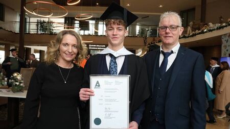 Congratulations: Mayo man celebrates recent graduation with family