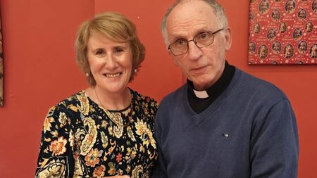 Local Notes: Fr Gerry and Carmel cut the cake at Cooneal Community Christmas Party.