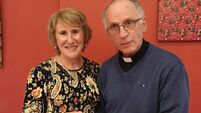 Local Notes: Fr Gerry and Carmel cut the cake at Cooneal Community Christmas Party.