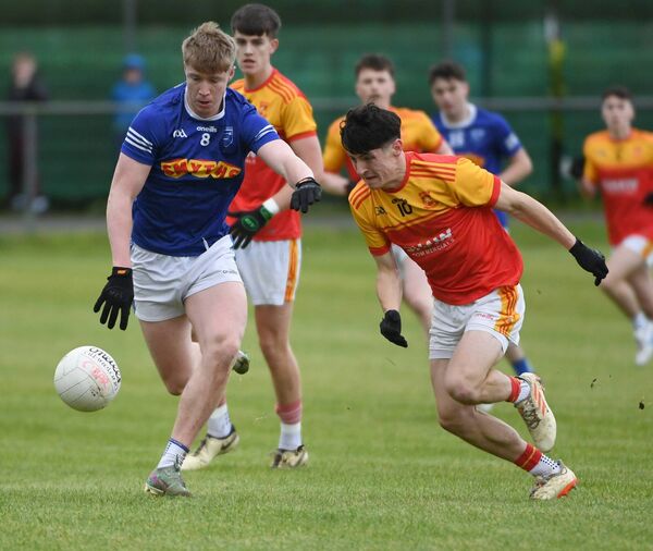 Castlebar Mitchels’ John Kennedy and MJ Duffy of Claremorris contest the ball.