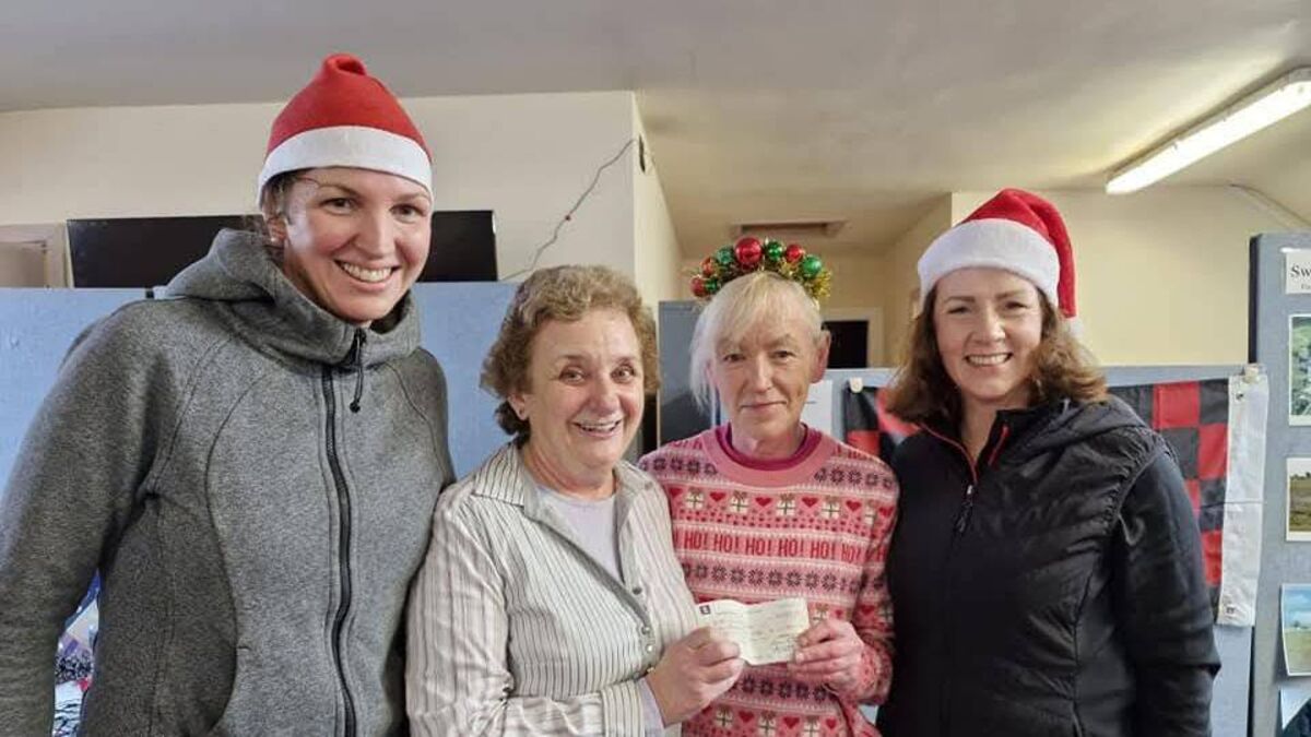 Local Notes: Swinford Athletic club present proceeds of Santa Run to Swinford St Vincent de Paul.