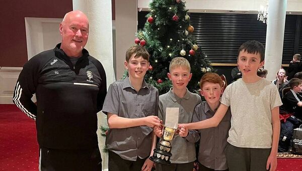 Congratulations to the sports quiz team in Rathlee NS on winning the Cuman na mBunscol quiz held in the Sligo Southern Hotel on December 10 last. This is a great achievement and the boys will now represent Sligo in the Connaught competition. They are pictured with Sligo Cuman na mBunscol Chairperson, Tony Gallagher.