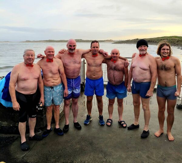 Seven men from the Ballina and Killala areas confronted the elements last month to take a dip in the Atlantic Ocean off Ross Beach for charity, wearing only a bow tie and togs. From left are charity swimmers Damien McHale, Ivan Beattie, Noel Cribben, Kieran Troy, Padraic Barrett, Frank Sheridan and Gregory Placidi. They are raising money for Cancer Care West and donations are being accepted online at iDonate.