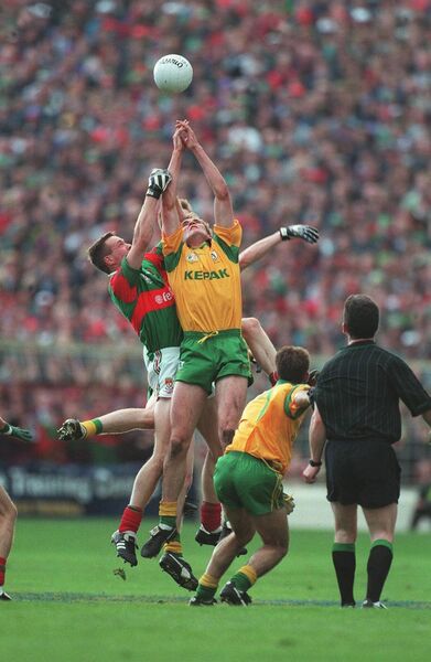 Mayo's David Brady climbs high with John McDermott of Meath during the 1996 All-Ireland SFC final. 
