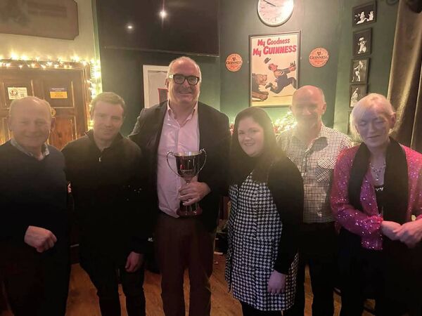 Members of the Moore family, Anita and Eddie, presenting the Moore Tournie Memorial Cup to Cathal Kelly with Swinford AC Committee members Padraic Walsh, Michael Oliver and Adette Gallagher. Members of the Moore family, Anita and Eddie, presenting the Moore Tournie Memorial Cup to Cathal Kelly with Swinford AC Committee members Padraic Walsh, Michael Oliver and Adette Gallagher.
