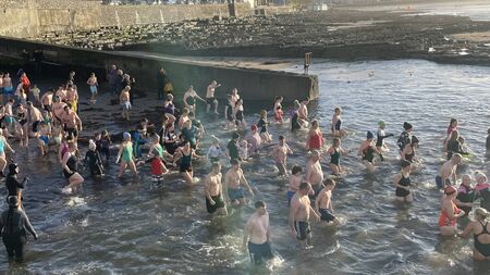Local Notes: New Year's Day Swim at Enniscrone Pier.