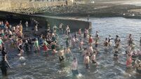 Local Notes: New Year's Day Swim at Enniscrone Pier.
