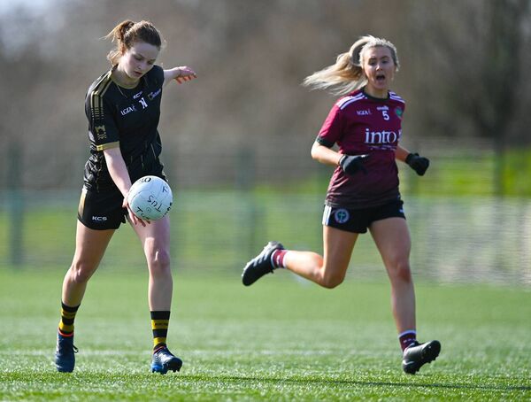 Ciara Whyte shoots under pressure from Ella Miller during the Yoplait LGFA Lynch Cup Final match between TUS Midlands and St Mary's Belfast in 2022.	Picture: Piaras Ó Mídheach/Sportsfile
