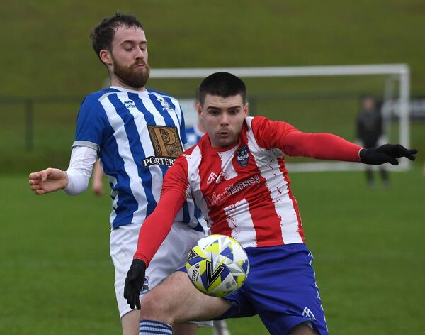 Ballina Town’s Matthew Cowan shields the ball from Maree Oranmore’s Jack Morrissey during the Connacht FA Junior Cup at Belleek Park last Sunday. Picture: David Farrell Photography Ballina Town’s Matthew Cowan shields the ball from Maree Oranmore’s Jack Morrissey during the Connacht FA Junior Cup at Belleek Park last Sunday. Picture: David Farrell Photography