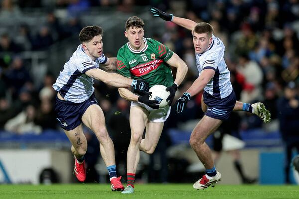 Mayo debutant Davitt Neary taking on Dublin defenders David Byrne and Greg McEneaney in Croke Park last Saturday evening.	Picture: INPHO/Laszlo Geczo