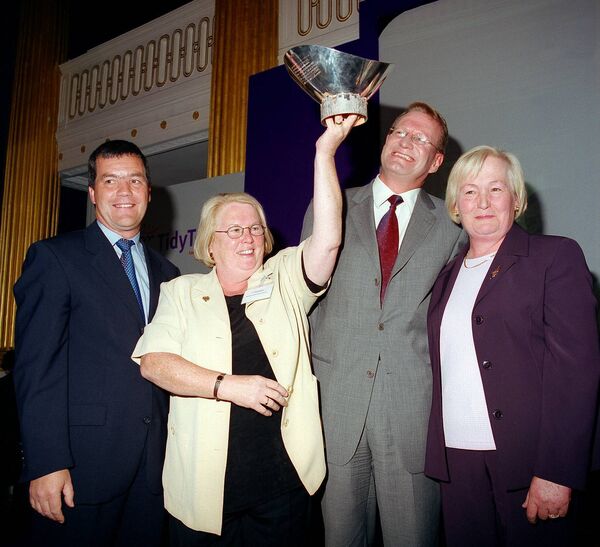 Margaret Adams then vice chair of Westport UDC and Bridie Moran Chairperson of Westport Tidy Towns Committee pictured celebrating with their trophy as the overall winners of the Tidy Towns Competition 2001, with Mr Noel Dempsey, TD Minister for the Environment and Mr Eoin McGettigan, Executive Chairman of SuperValu, at the ceremony in Dublin Castle Margaret Adams then vice chair of Westport UDC and Bridie Moran Chairperson of Westport Tidy Towns Committee pictured celebrating with their trophy as the overall winners of the Tidy Towns Competition 2001, with Mr Noel Dempsey, TD Minister for the Environment and Mr Eoin McGettigan, Executive Chairman of SuperValu, at the ceremony in Dublin Castle