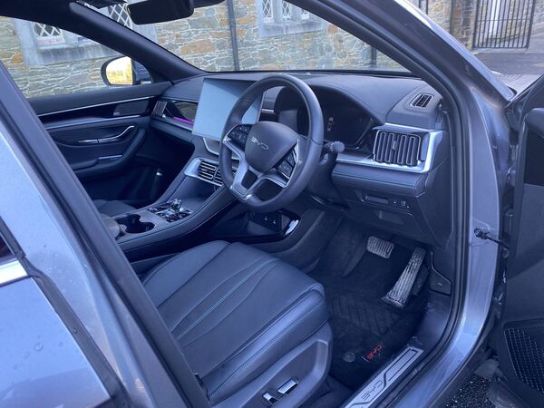 The beautifully finished interior features a panoramic sliding roof and a floating centre console touchscreen.