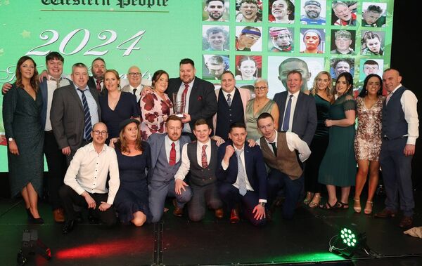 Shane McHale, holding the crystal, with his teammates, family and friends of Erris Darts who were presented with the Community award at the 2024 Western People Mayo Sports Stars Awards. Picture: Michael Donnelly