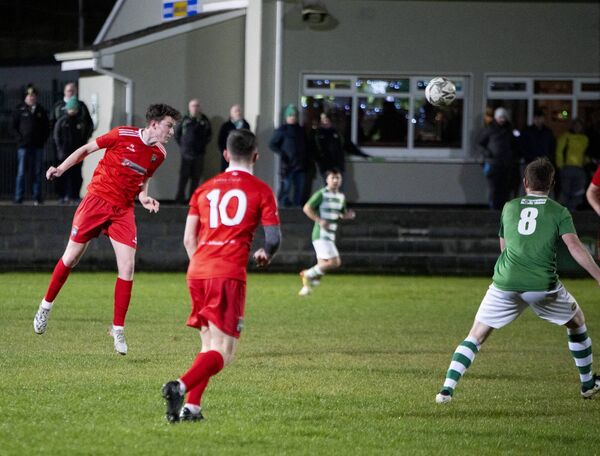 Ballinrobe Town's Aaron McDonnell heads the ball away. Picture: John Corless Ballinrobe Town's Aaron McDonnell heads the ball away. Picture: John Corless