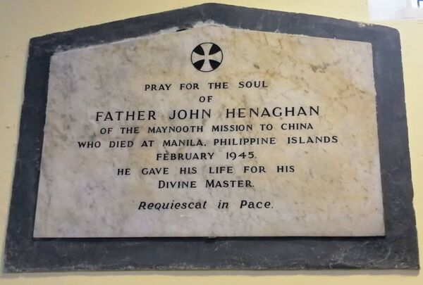 A plaque in Louisburgh Church commemorates Fr John Heneghan. A plaque in Louisburgh Church commemorates Fr John Heneghan.