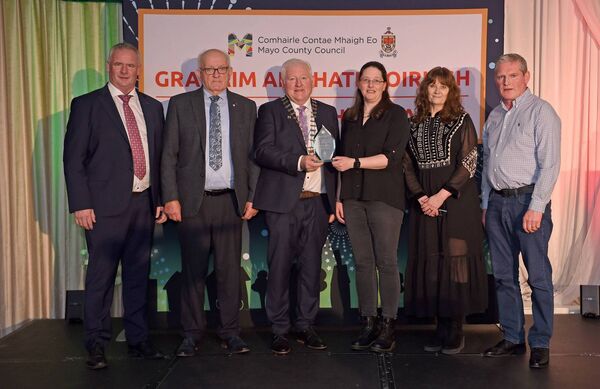 Pictured at the Cathaoirleach’s Awards 2024 being presented with their award by Cathaoirleach Cllr John O’Hara were the joint winners of the Contribution to Local Heritage &amp; Biodiversity Awards - Contribution to Local Heritage - Louisburgh-Killeen Heritage. 