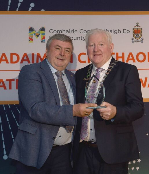 Pictured at the Cathaoirleach’s Awards 2024 being presented with his award by Cathaoirleach Cllr John O’Hara was the winner of Diaspora Awards – Mayo Diaspora Outstanding Engagement - Noel Howley.