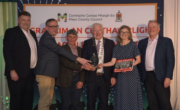 Pictured at the Cathaoirleach’s Awards 2024 being presented with their award by Cathaoirleach Cllr John O’Hara were the winners of the Mayo Publication Awards: Publication from Community Groups - Moy Davitts Golden Jubilee 1974-2024. 