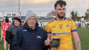 Powerful Knockmore stroll to Sweeney Cup success