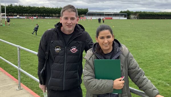 Ballintubber GAA Club officers Colin Derrig and Aisling Dempsey Clarke going through the preliminary check list before the recent Ballintubber v Burrishoole clash in the Kelly Cup at Clogher. Pic by Tom Quinn
