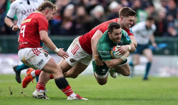 Caolin Blade scores a try for Connacht despite the best efforts of Munster's Jack Crowley. Picture: INPHO/James Crombie Caolin Blade scores a try for Connacht despite the best efforts of Munster's Jack Crowley. Picture: INPHO/James Crombie