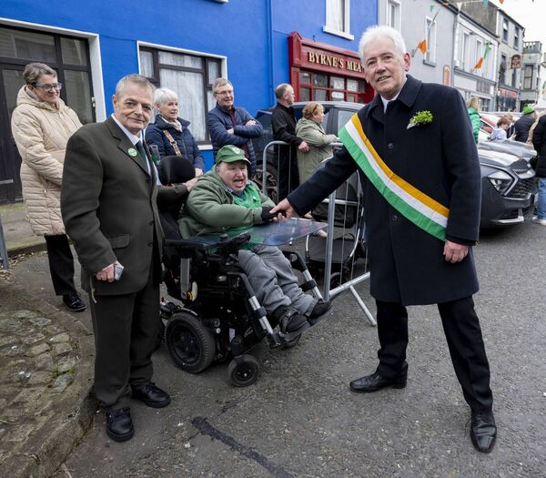 Grand Marshal Henry Kelly meets Kevin Power and his father Martin (right) at the St Patrick's Day Parade in Kiltimagh. Picture: John Corless Grand Marshal Henry Kelly meets Kevin Power and his father Martin (right) at the St Patrick's Day Parade in Kiltimagh. Picture: John Corless
