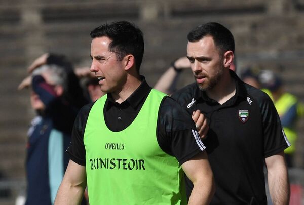 Aaron Kernan and fellow Sligo selector, former Mayo footballer Kevin McLoughlin, viewing the game from the sideline.	Picture: David Farrell Photography 