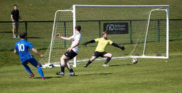 Ballina Town's Benny Lavelle, left, sends an early shot wide. Picture: John Corless Ballina Town's Benny Lavelle, left, sends an early shot wide. Picture: John Corless