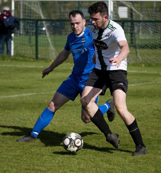 Conn captain Owen McNamara shields the Ballina striker, Ryan Moran. Picture: John Corless Conn captain Owen McNamara shields the Ballina striker, Ryan Moran. Picture: John Corless