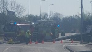 Emergency services at scene of Mayo county town road accident