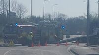 Emergency services at scene of Mayo county town road accident