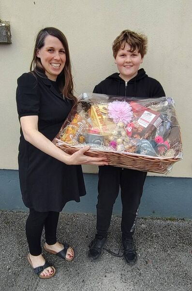 Elisa Toner is pictured presenting Rhys Gaughan with first prize in the Easter raffle at the recent Ballyglass Market. Elisa Toner is pictured presenting Rhys Gaughan with first prize in the Easter raffle at the recent Ballyglass Market.