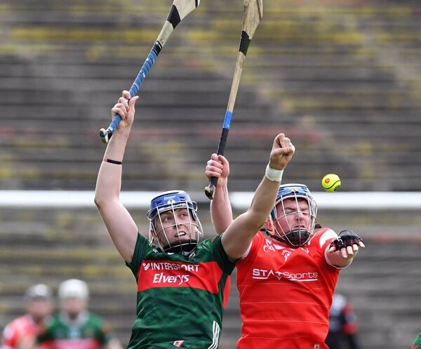 Mayo’s Eoin Ryan and Louth’s Paddy Lynch battle for the sliotar at midfield during the Nicky Rackard Cup championship at Hastings Insurance MacHale Park, Castlebar, last Saturday. Picture: David Farrell Photography 