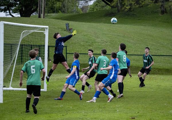 Ballyheane goalkeeper Luca Meldrum punches clear from a Ballina corner Picture: John Corless